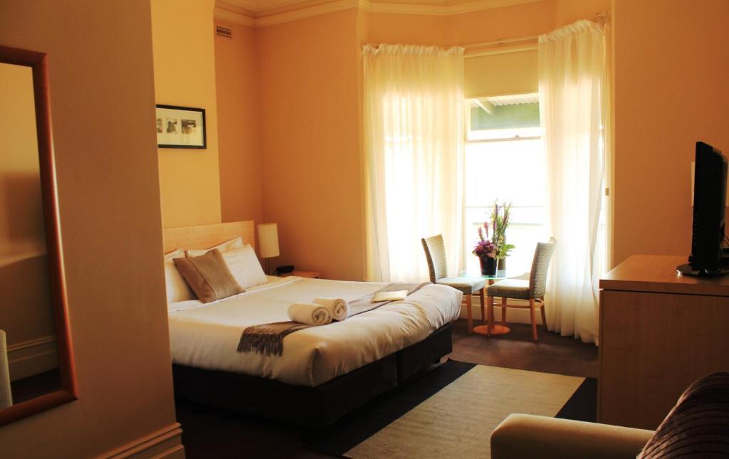 Grand Pacific Hotel & Apartments Лорн Номер фото